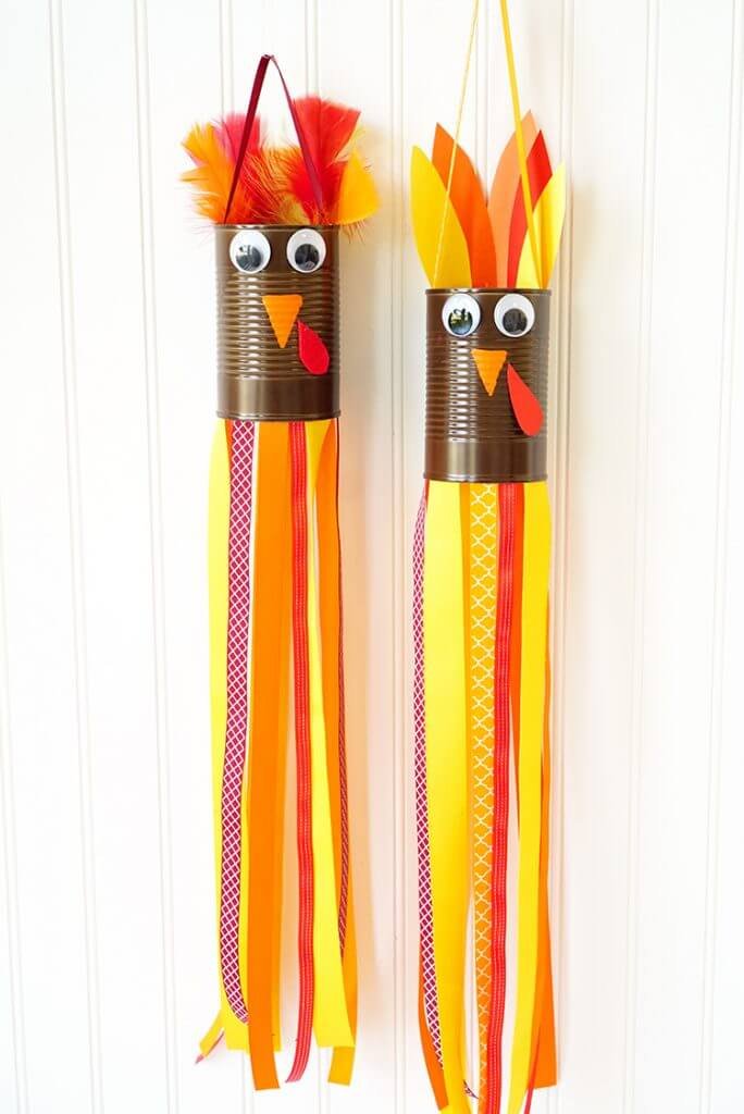 Colorful turkey windsocks made from tin cans