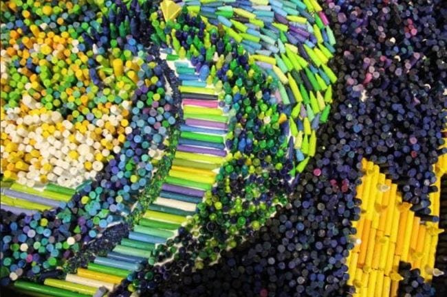 A mosaic made up of crayons is shown.