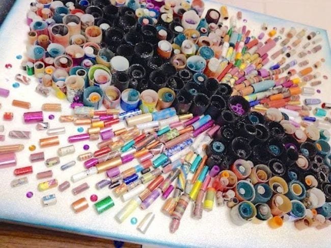 Beads are arranged into a design.