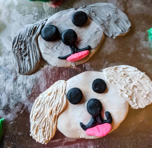 Clay puppy head magnets in gray and white