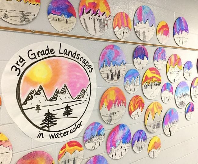 Collection of colorful winter landscapes painted on cardboard rounds