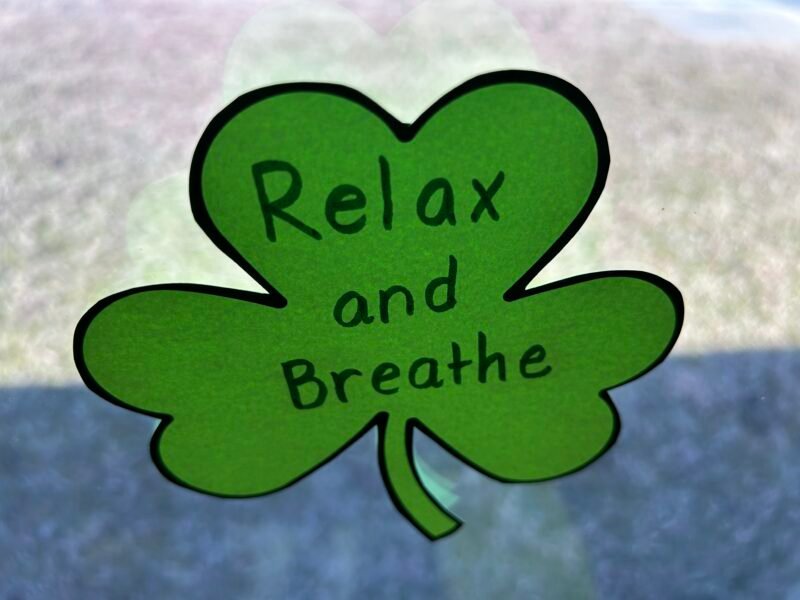 shamrock with words relax and breathe