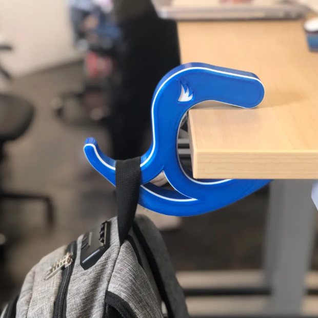 Blue bag holder on desk