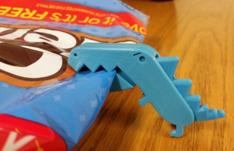 Snack bag clip shaped like a dinosaur