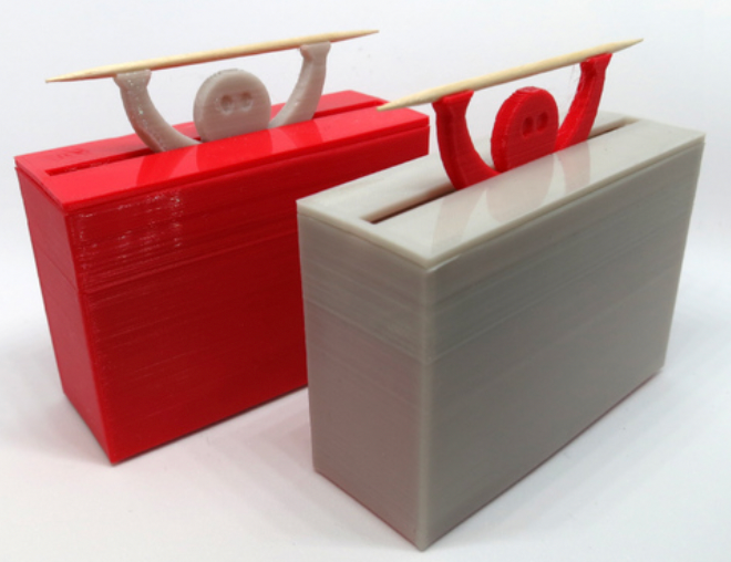 3d printed toothpick holder with little figure holding up toothpick
