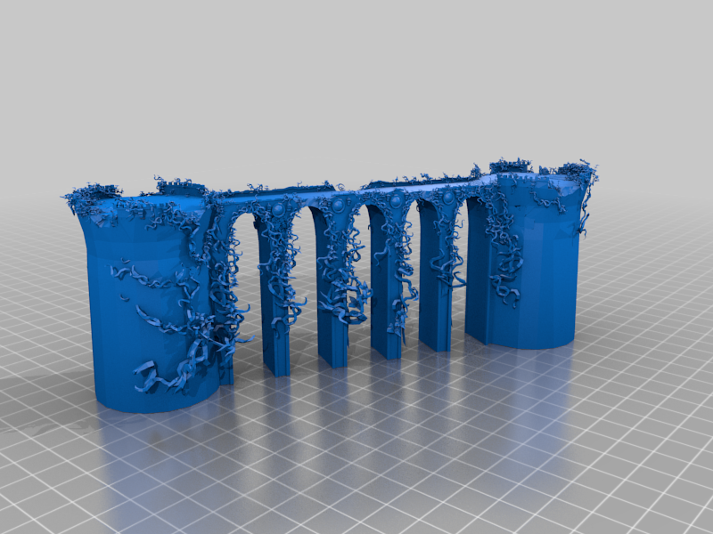 A 3D printed blue model of ancient ruins is shown.