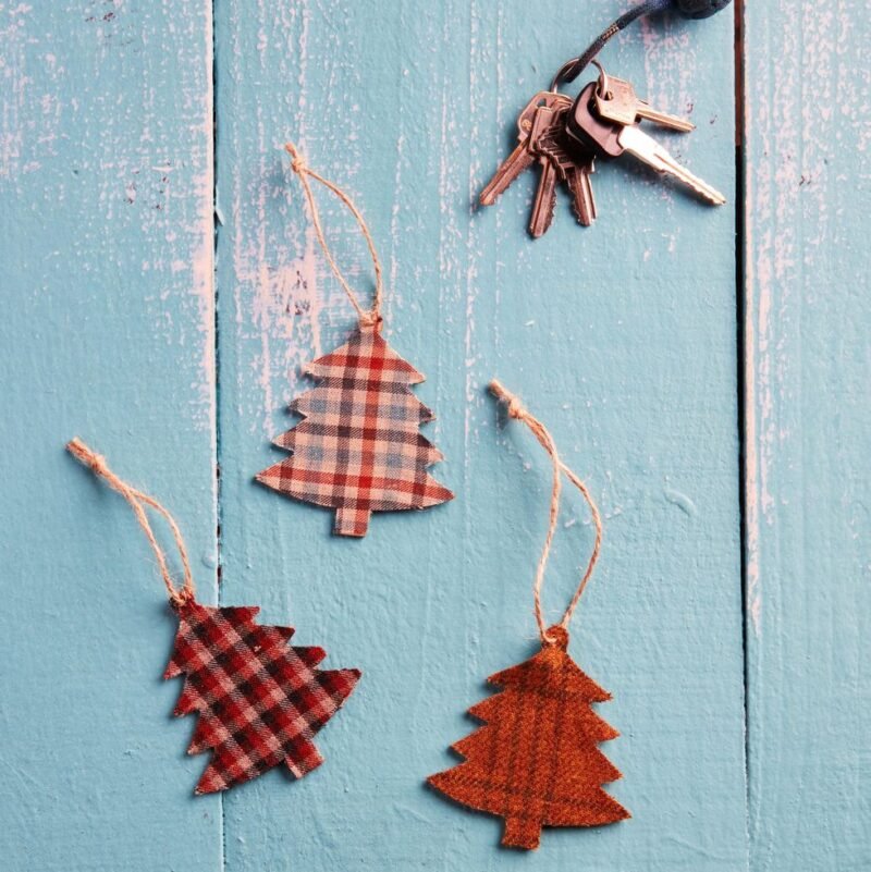 Several tree-shaped air fresheners made from plaid fabric