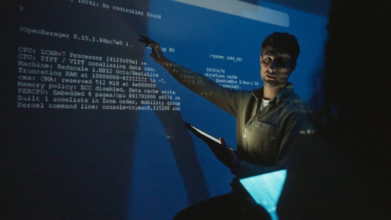 The software engineering team is meeting to review code and enhance the capabilities of the artificial intelligence