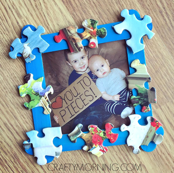 Photo frame with puzzle pieces