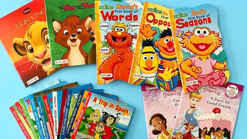 Multiple books for different age ranges span out on a light blue background.