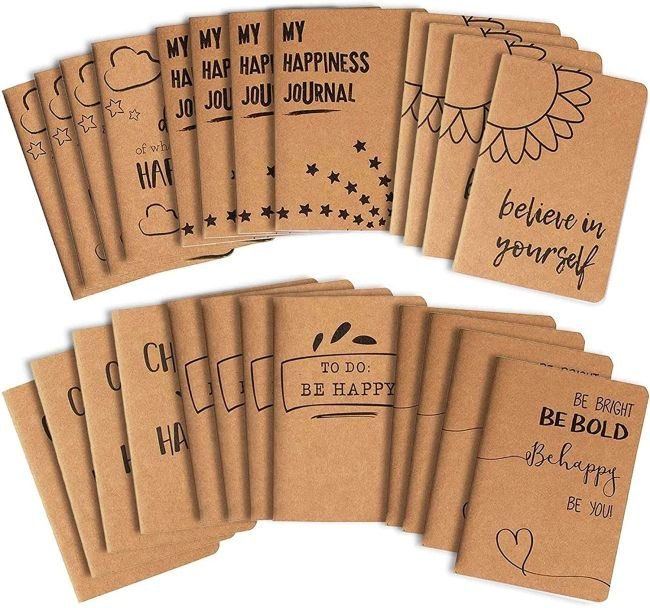 Selection of kraft journals with happy sayings