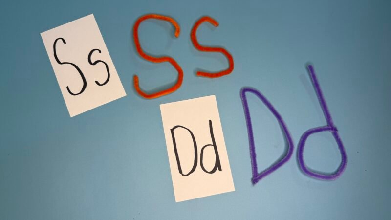 Letters of the alphabet bent with colorful pipe cleaners