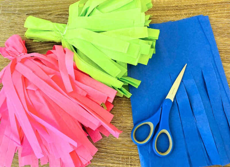 student council ideas - DYI pom poms on desk