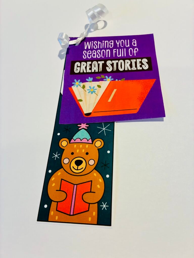 holiday gift tag example for a student gift called wishing you a season full of great stories along with a winter bookmark