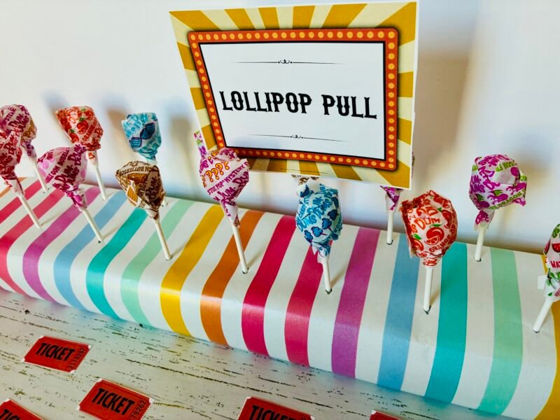 a carnival game for kids: lollipop pull