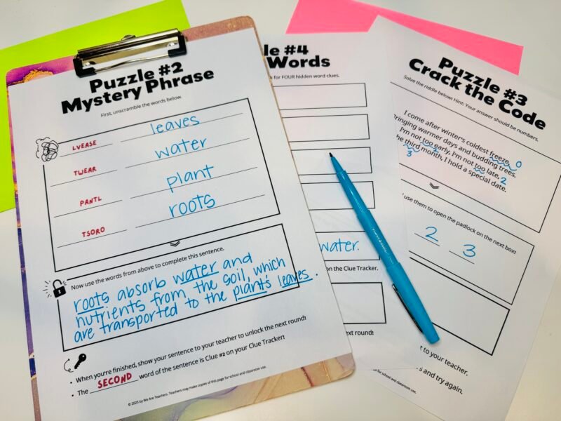 three escape room printable examples with a blue pen