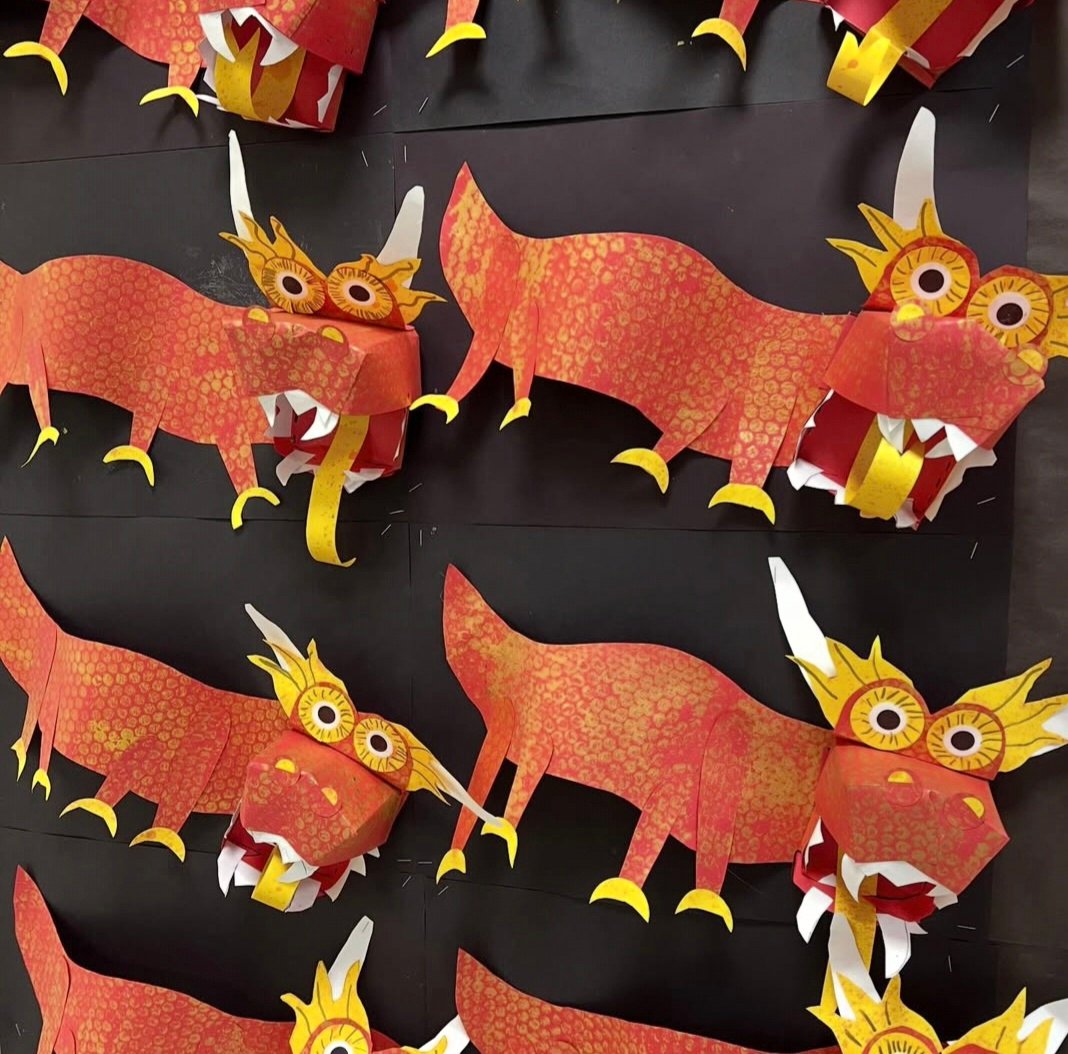 Paper Chinese dragons on a black background