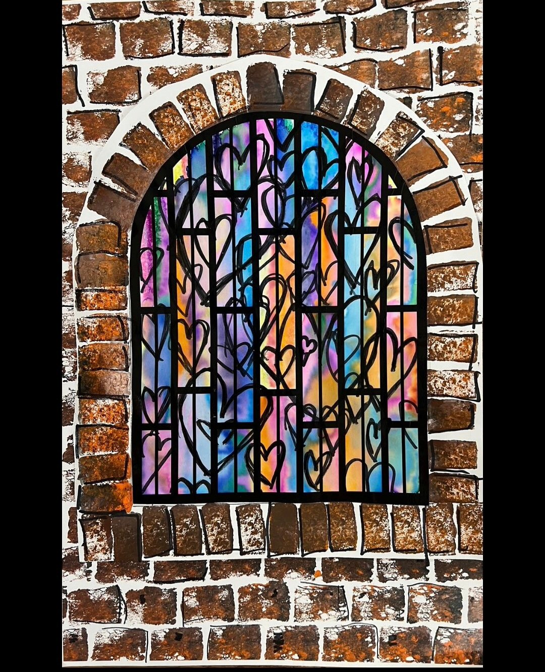 Stained glass window painting by 1st graders