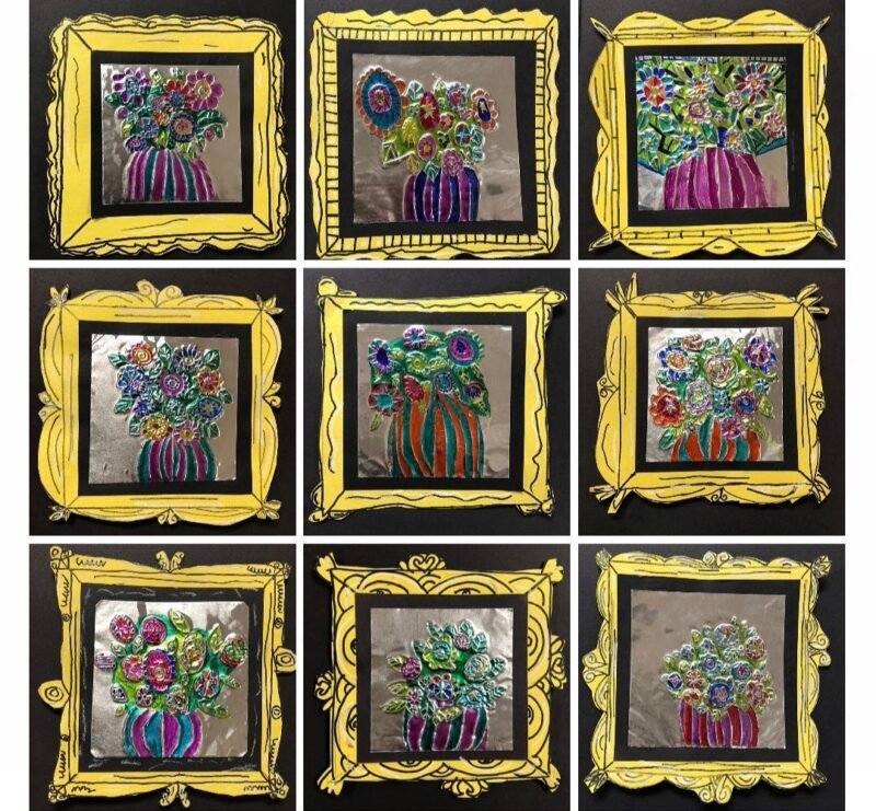 Foil embossed flowers with gold frames made by 2nd grade art students