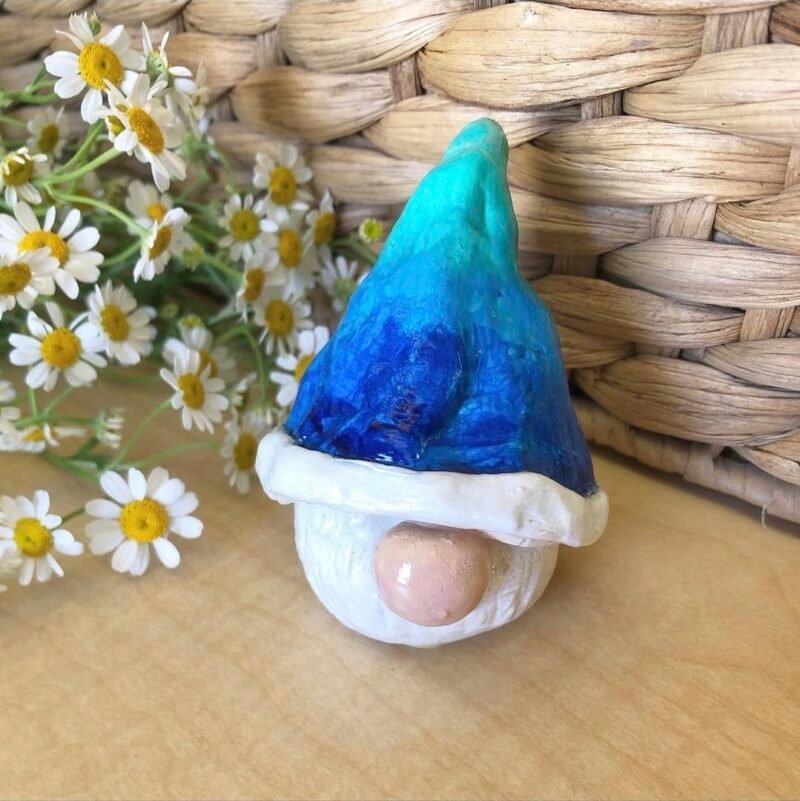 Simple clay gnome head with a blue ombre hat