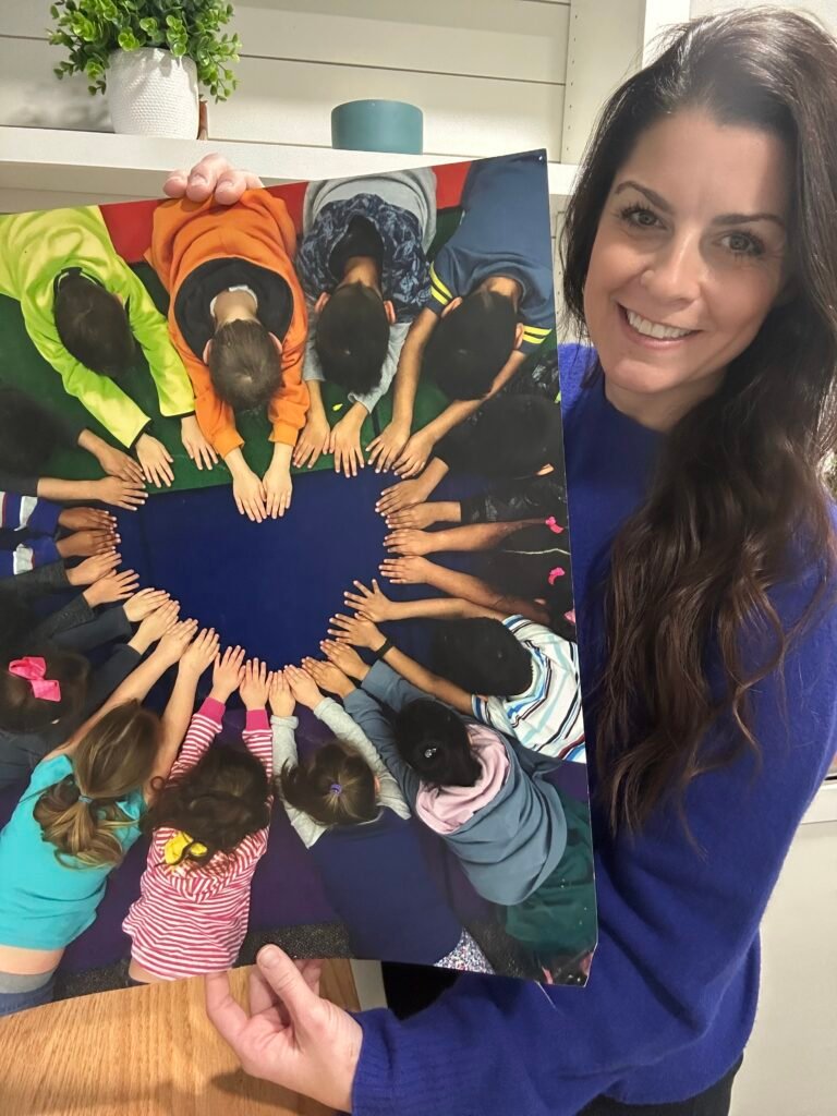 Hilary holding heart