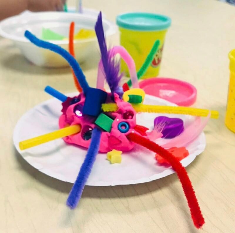 Abstract sculpture made from playdough, pipe cleaners, and beads
