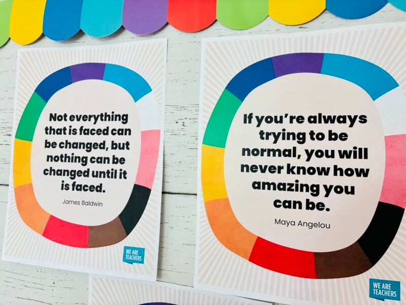 an image of two printable Pride Month posters on a classroom whiteboard