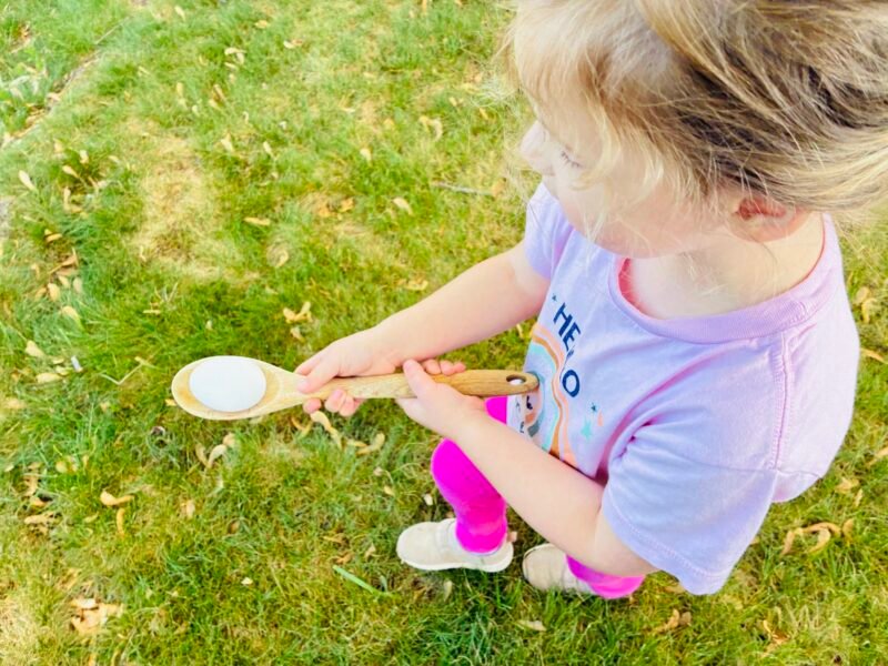 Fine Motor Activities an image of a fine motor activity where students participate in a spoon and egg race